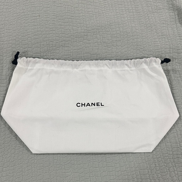 CHANEL Handbags - CHANEL White and Black Cosmetic Pouch